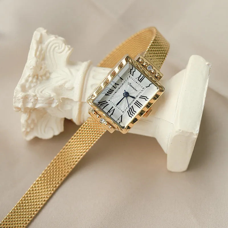 Women's rectangular white gold Milan belt watch with white face and steel strap