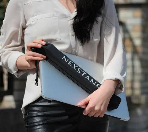 Black reinforced nylon folding laptop stand shown in a folded position with dimensions.