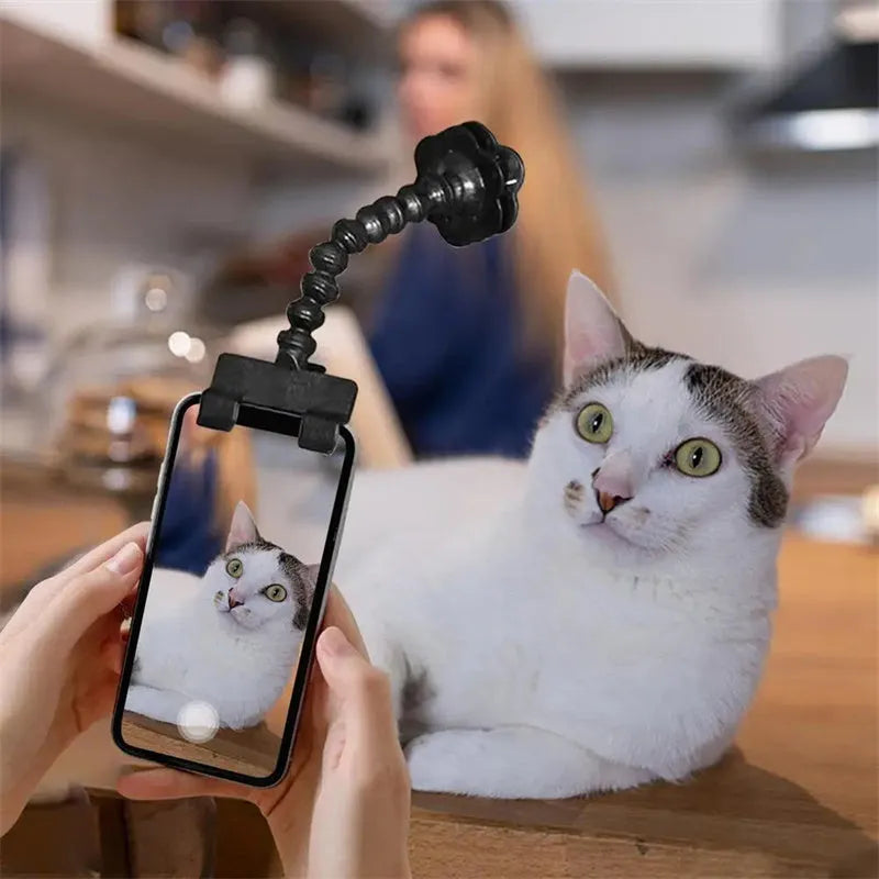 Black pet photography clip holder with rotating attachment for mobile phones and pet treats