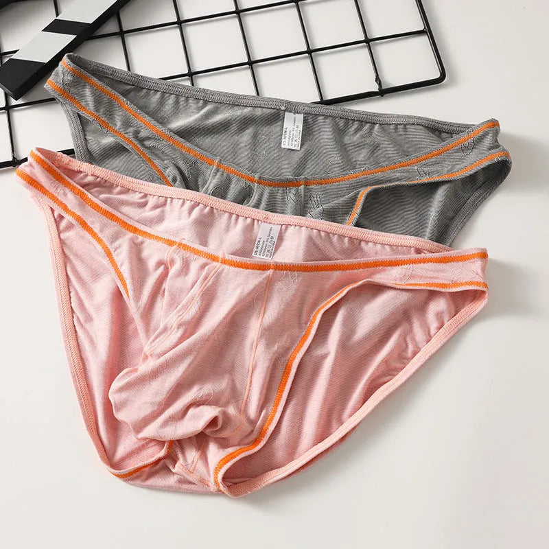 Men's modal hip-lift underwear in dark grey, pink, yellow green, blue, and sky blue colours.