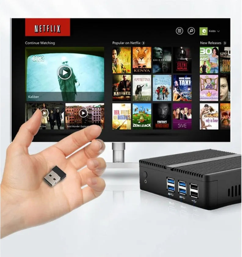 G30 Air Mouse wireless keyboard remote control with nano receiver on a table