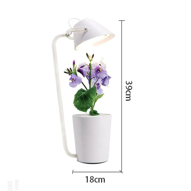 White plastic desktop hydroponic plant growth machine for soilless cultivation.