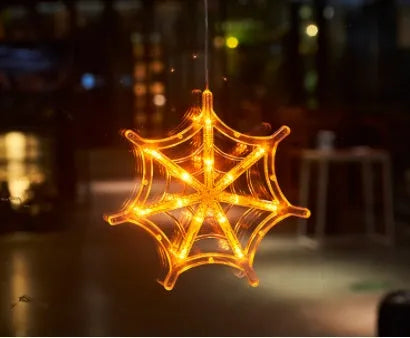 Halloween LED hanging lights with spider, pumpkin and ghost designs featuring suction cups for window mounting