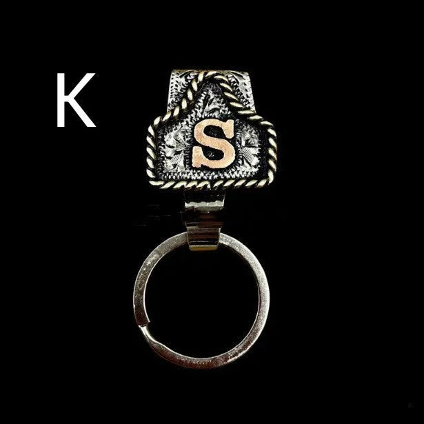 Handmade metal cow tag belt keychain in rustic design with multiple colour options