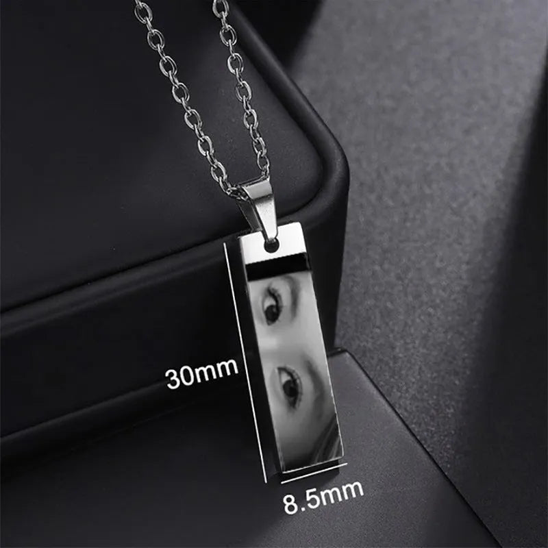 Custom stainless steel photo necklace with engraved eye design, geometric shape, and electroplating finish in a range of colours