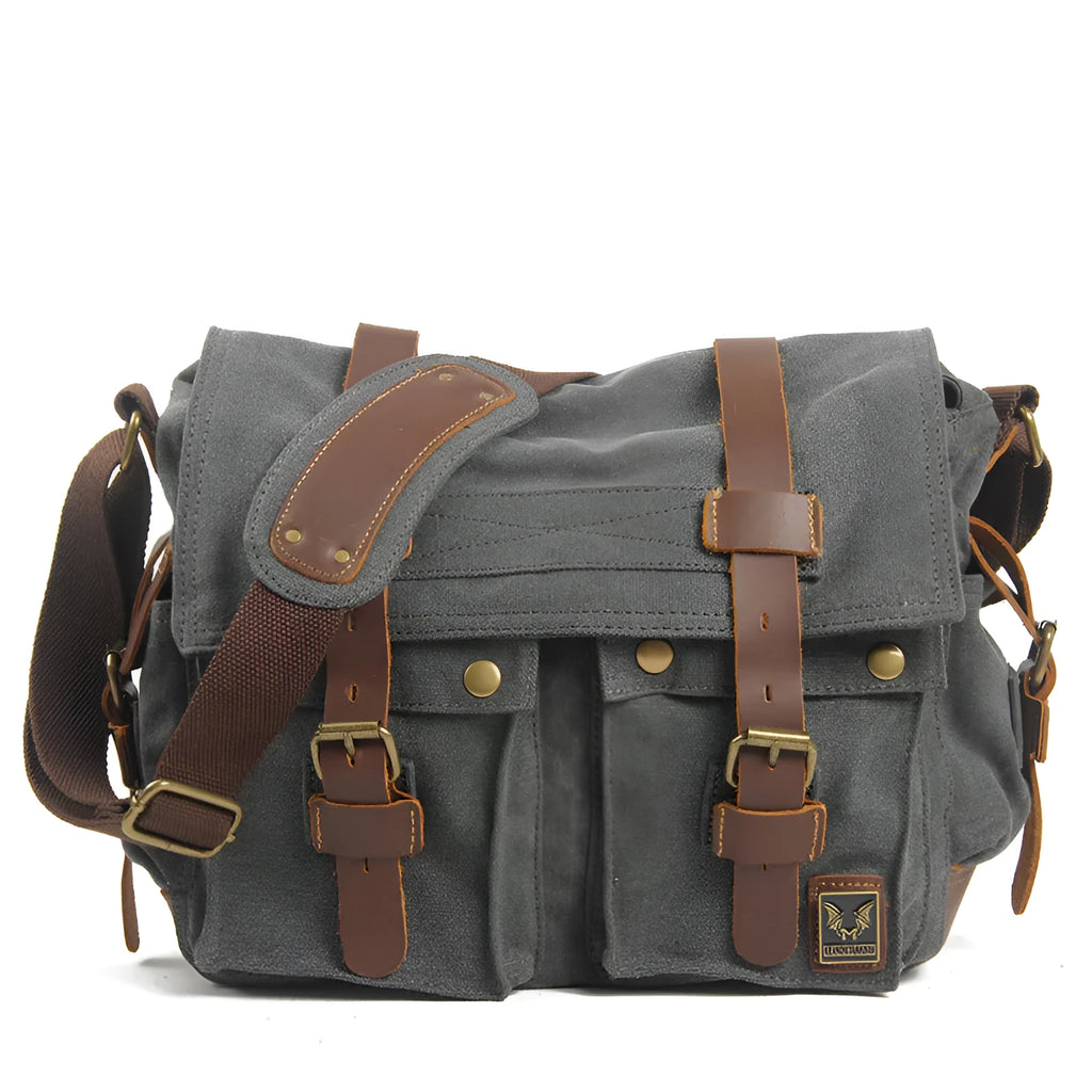 Men's retro canvas crossbody shoulder bag with flap closure and cowhide trim in Army Green colour.
