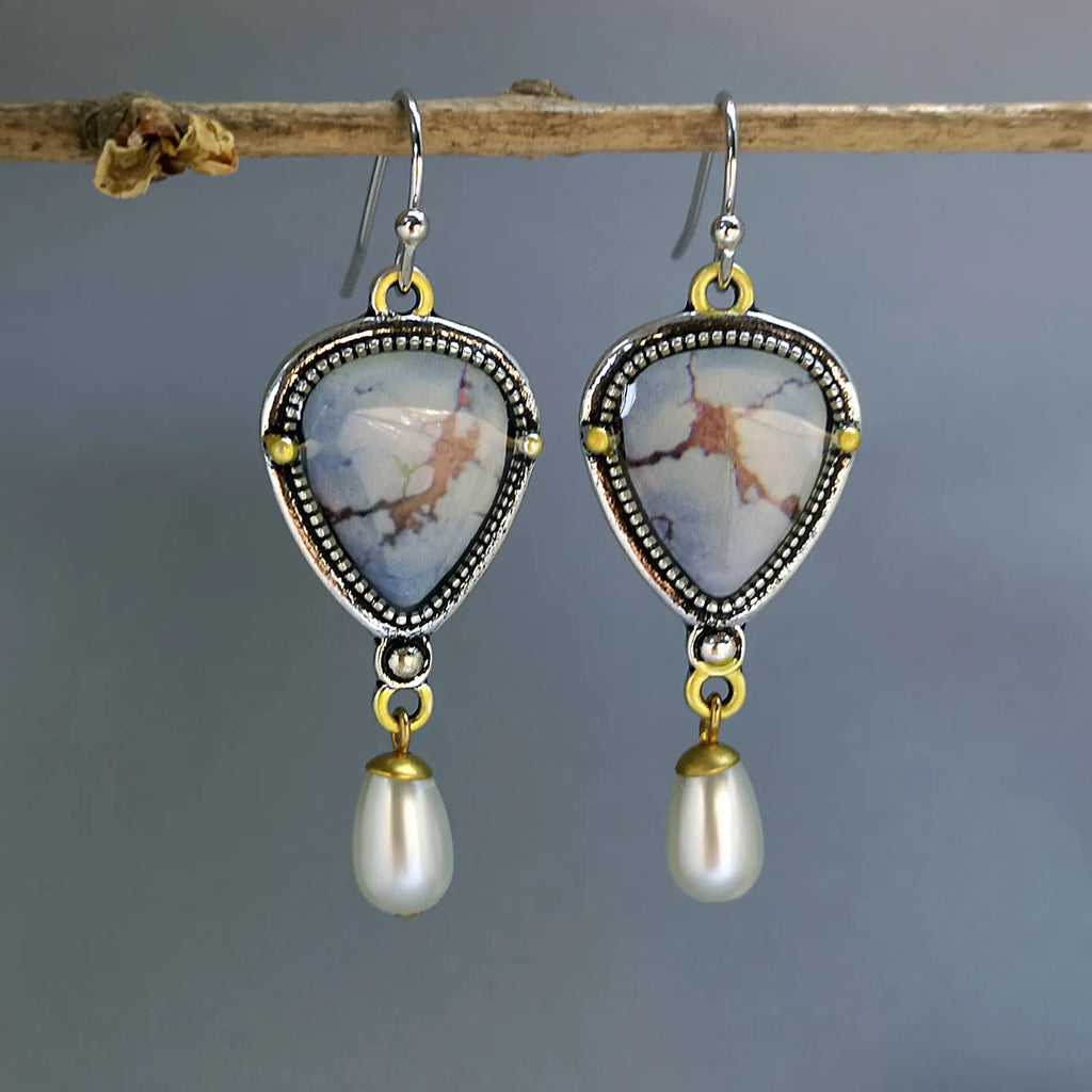Retro blue Bohemian drop earrings with synthetic opal and pearl details on metal geometric setting