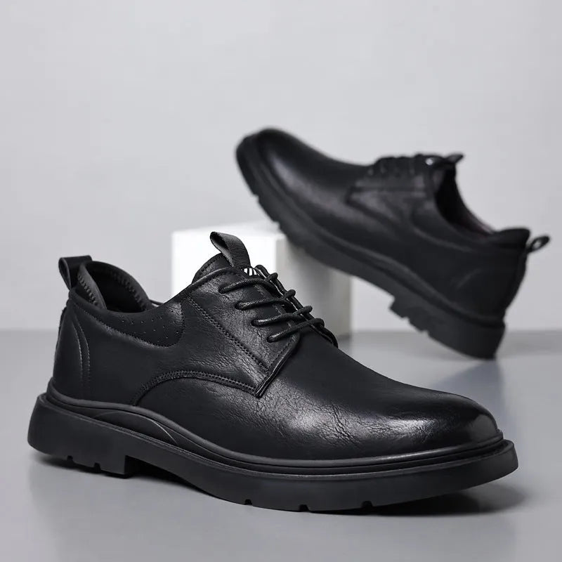 Men's black leather casual shoes with decorative sewing lines and rubber sole