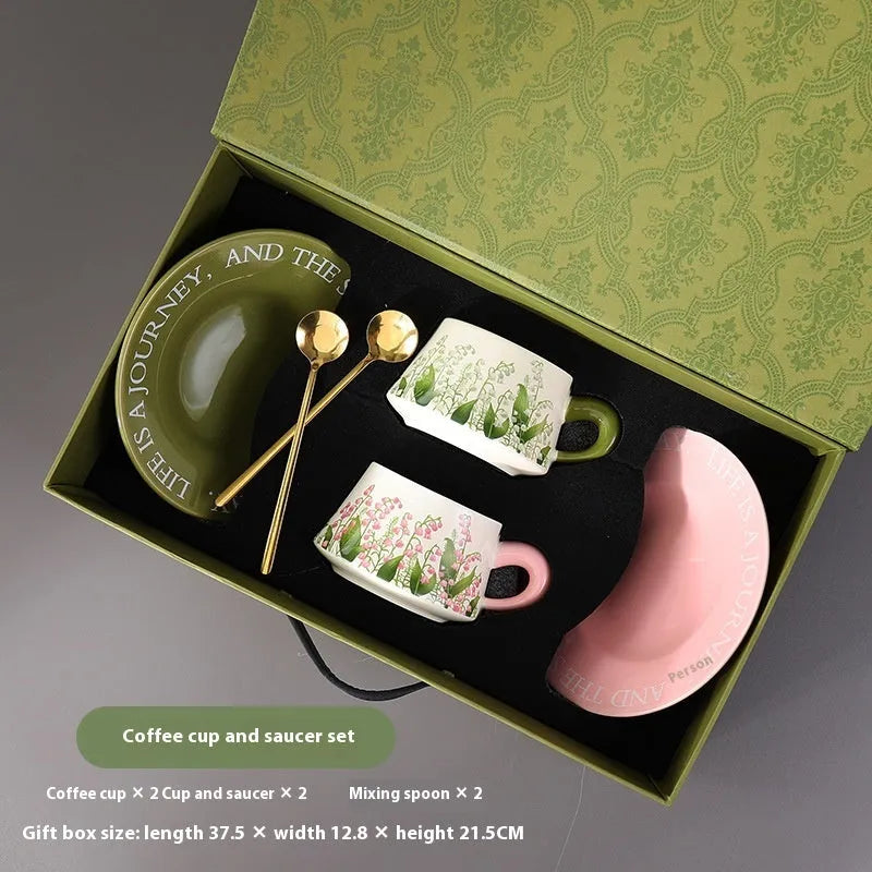 Ceramic coffee cup and saucer set for two with matching spoons in Campanula or Lanling Grass design