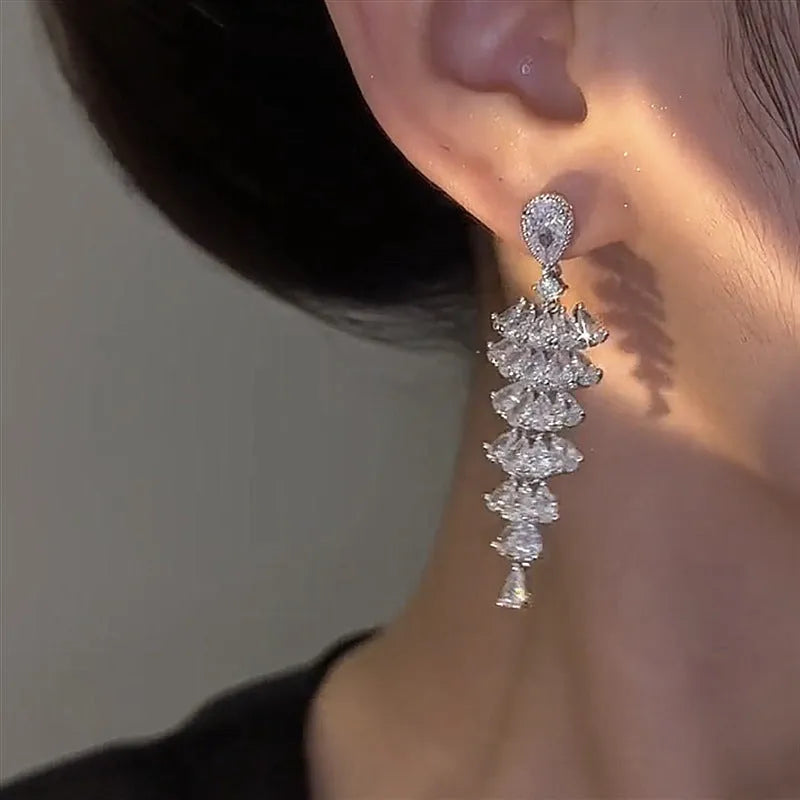 Women's silver pagoda colour Christmas tree drop earrings with pagoda shape on copper studs.