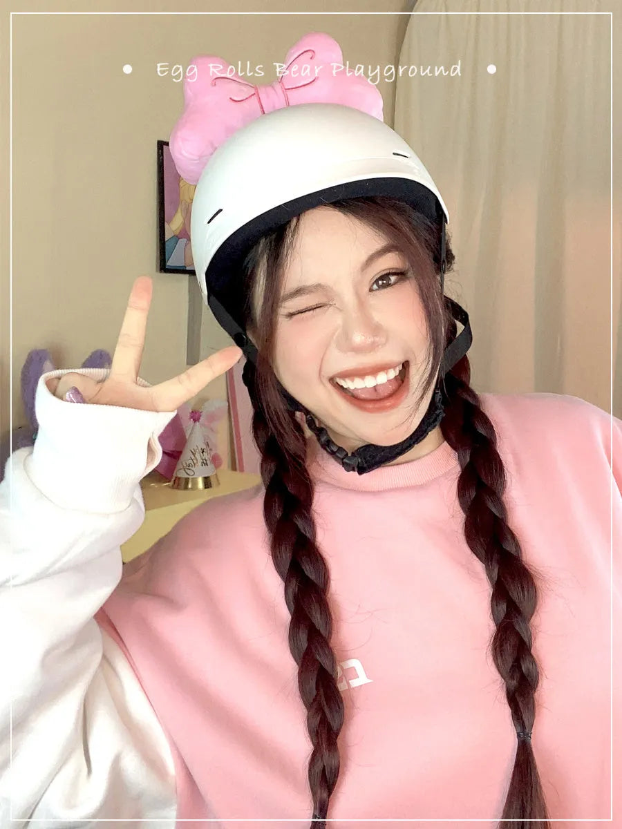 Large soft plush bow decoration for motorcycle or ski helmet in red, peach pink, or rose pink.