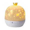 Dream Starry Sky crown projection lamp with rotating starry patterns on a dark background