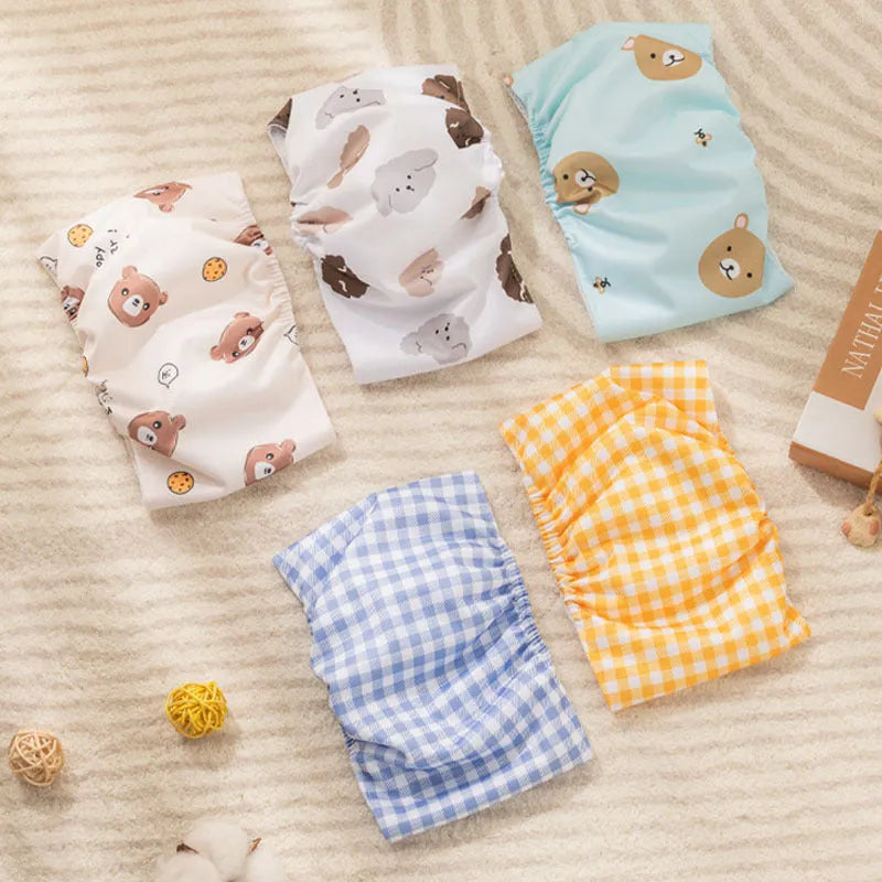 Reusable male dog diaper belly band wrap with cartoon bone paw print design and elastic waistband