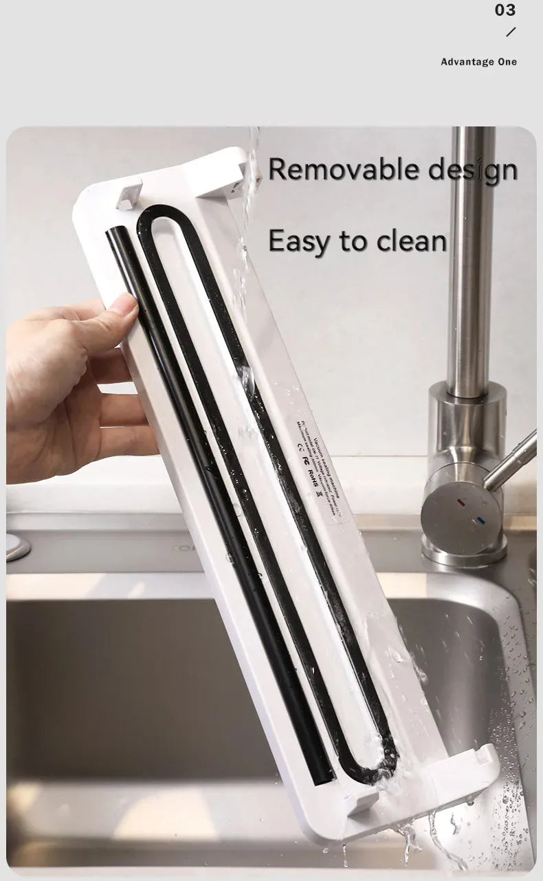 Small black automatic vacuum sealer machine for household food preservation with compact design