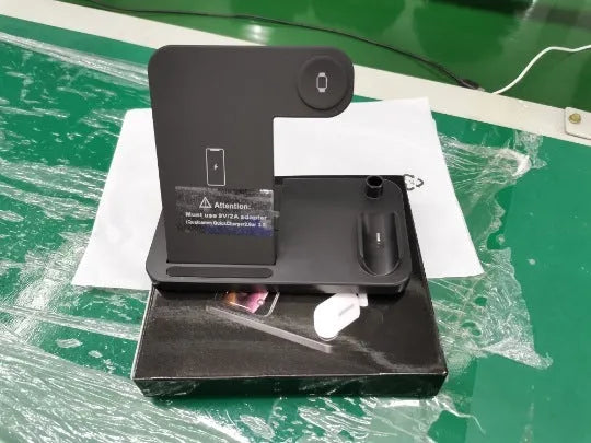 Foldable 4-in-1 wireless charger showing vertical orientation charging Apple iPhone AirPods and Apple Pencil