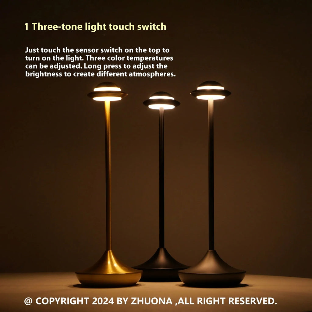 Black UFO-shaped metal desk lamp with touch dimming and three colour light modes