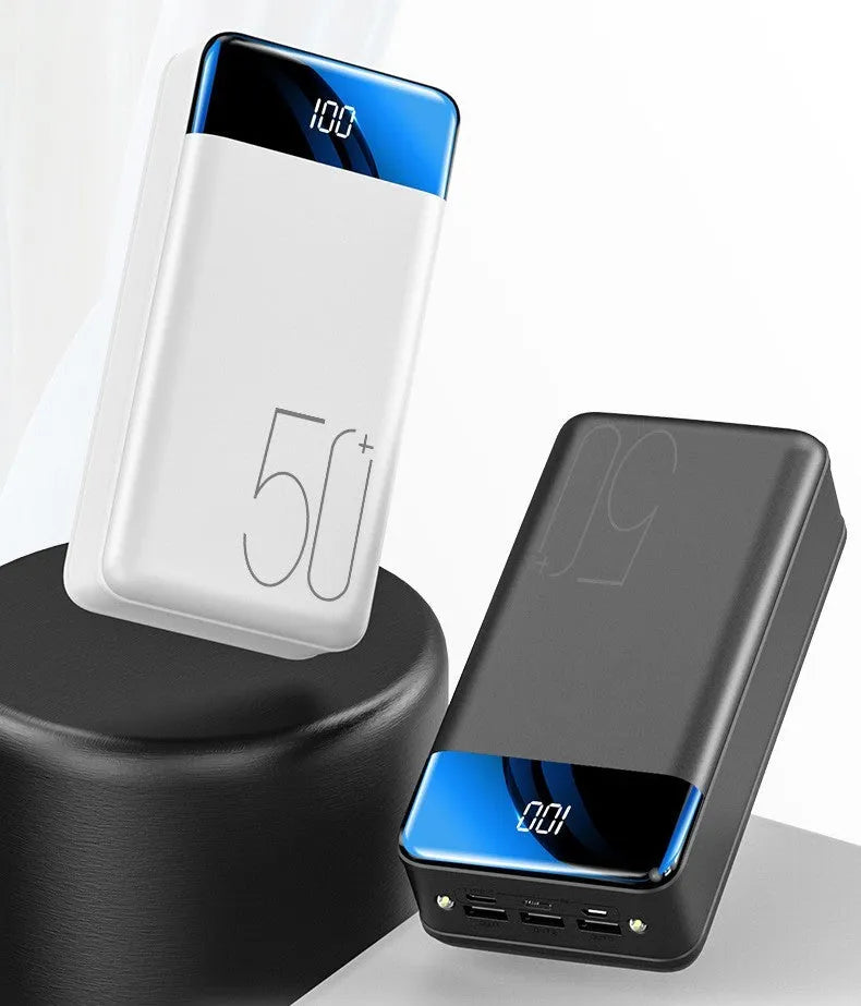 Large 50000mAh power bank in black or white with three charging ports and polymer lithium-ion cells
