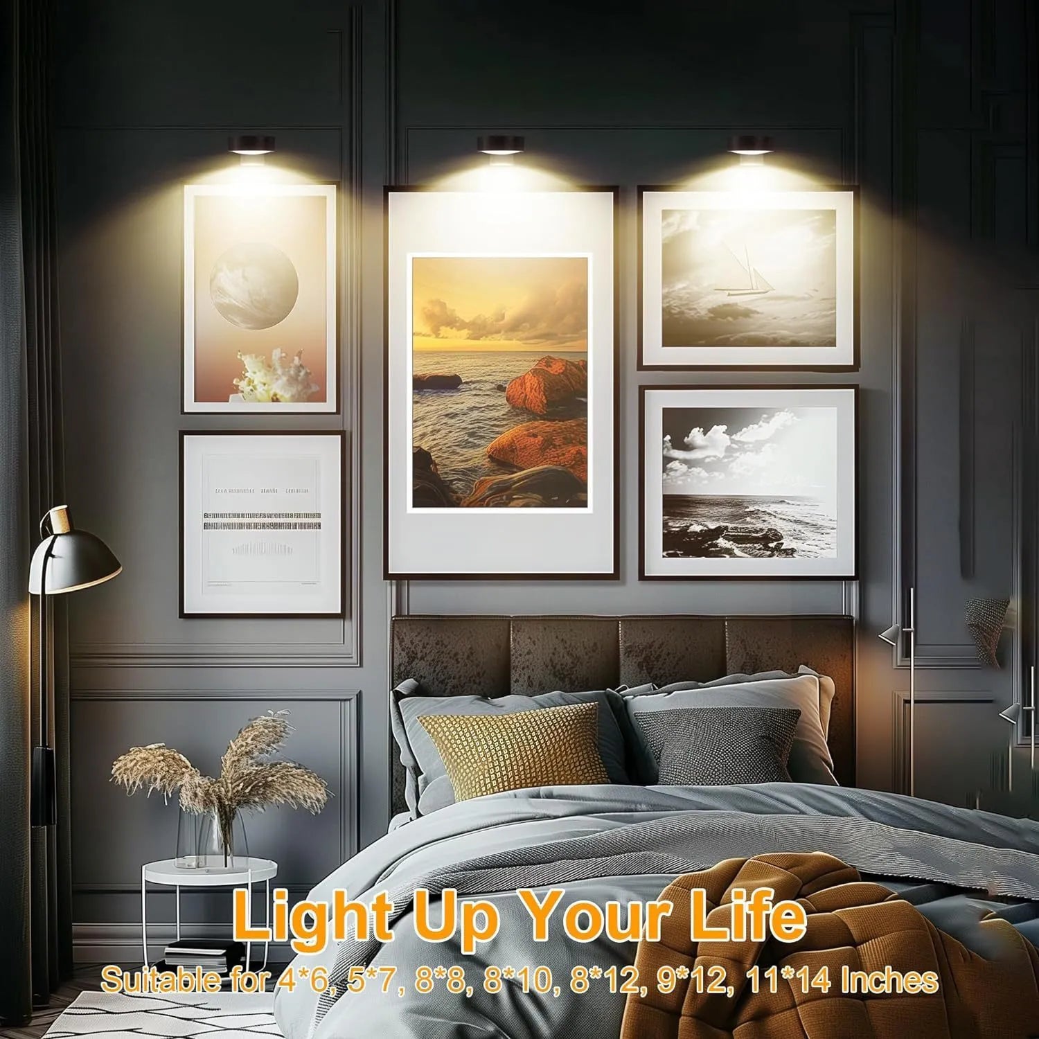 Magnetic LED light bars mounted around a painting, with a remote control on a table nearby.