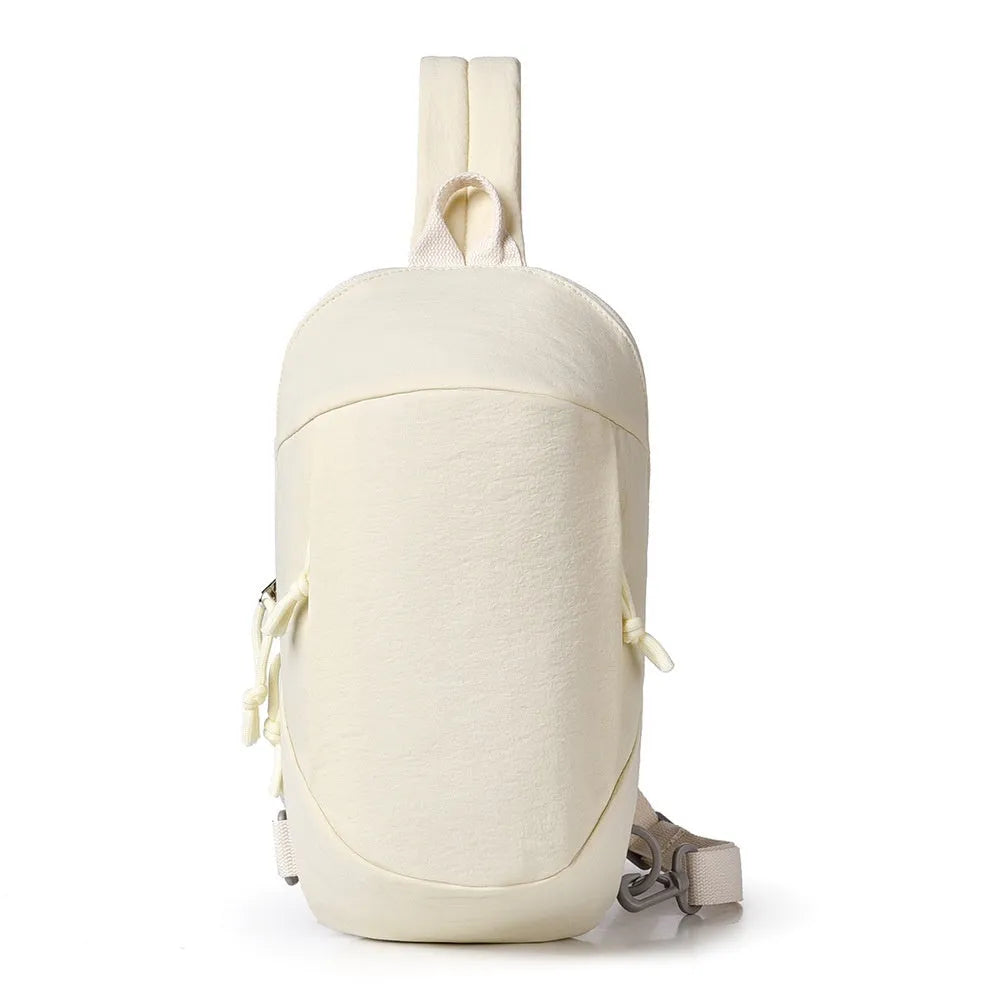 Outdoor girls crossbody bag in nylon, shown in army green with a mobile phone pocket.