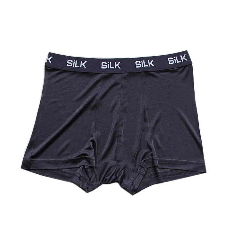 Men's navy blue silk shorts with loose fit and mid waist design