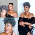 Short synthetic wig with simple rolls design in exotic style, shown in black colour.