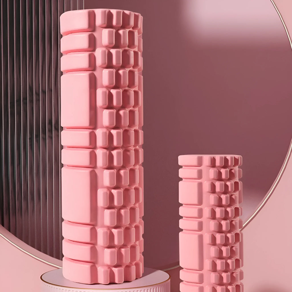 EVA foam roller for fitness in black, shown on a wooden floor.