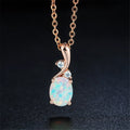 Water drop shaped opal pendant necklace on adjustable O-chain in rose gold or white finish