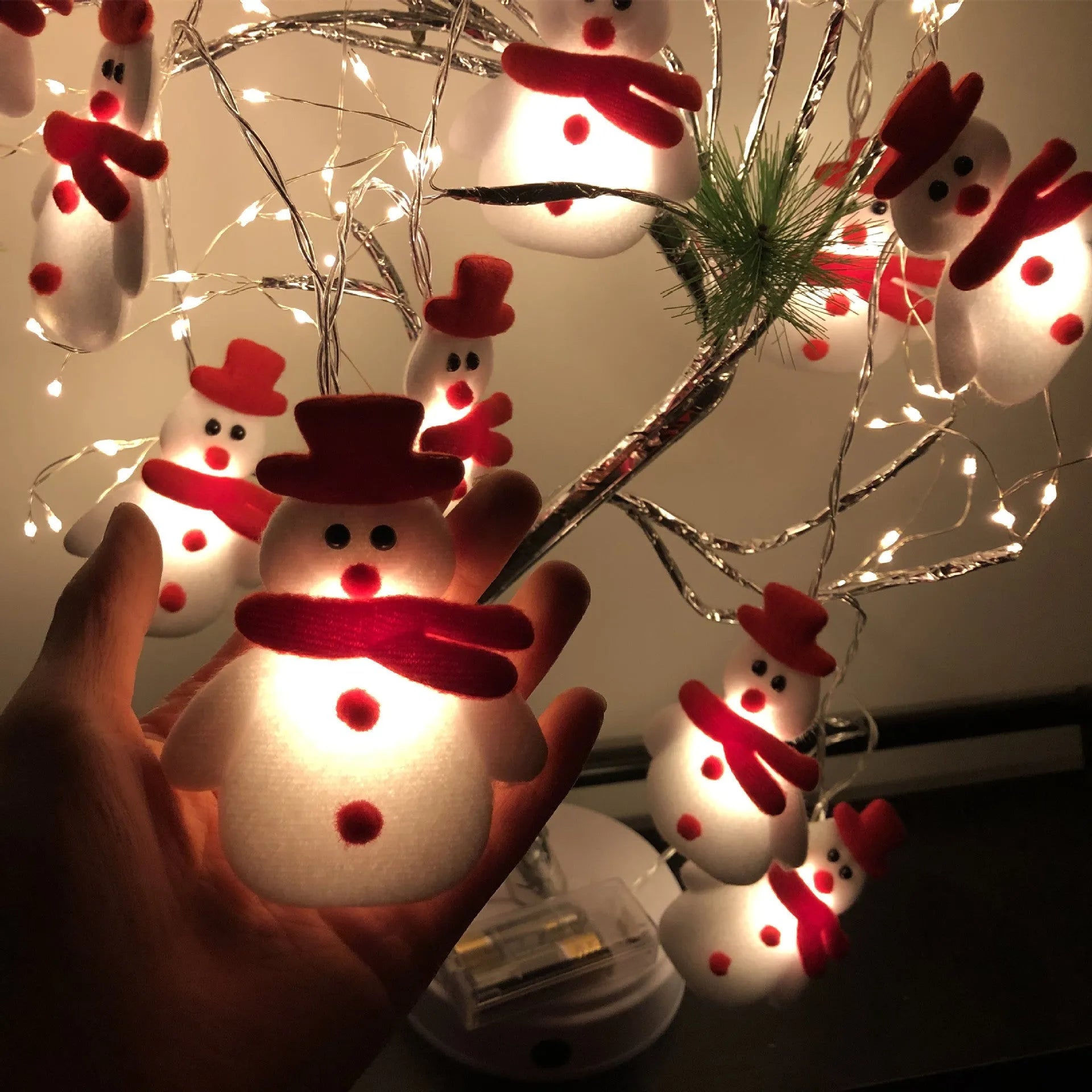 Christmas LED string lights with snowman decorations in warm white, available in 1.65m and 3m lengths