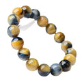 Handmade fantasy tiger eye agate bracelet with round beads on a neutral background.