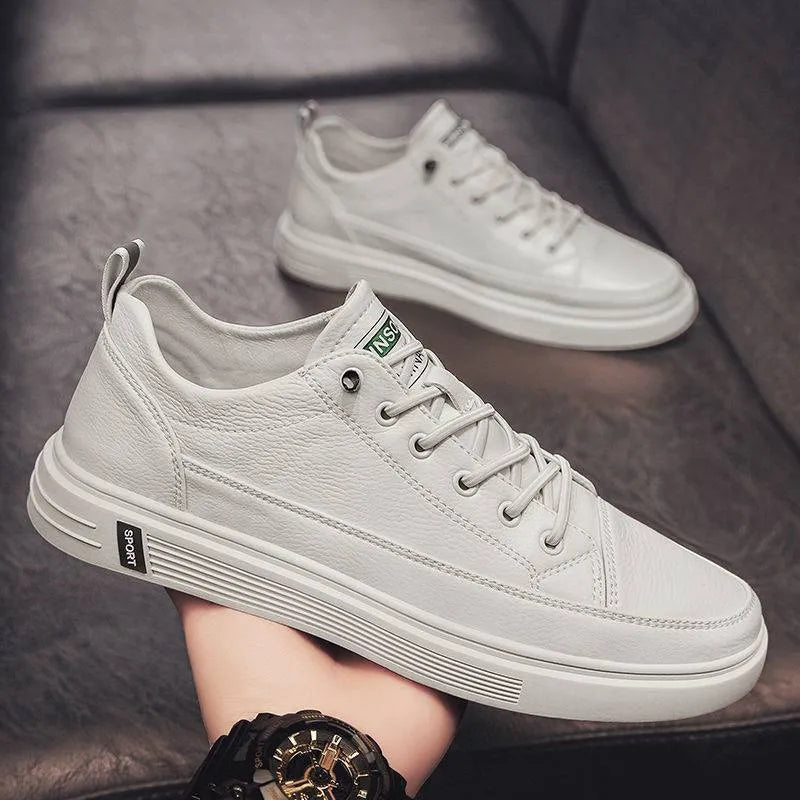 Men's white casual PU shoes with round toe and low flat heel on a plain background.