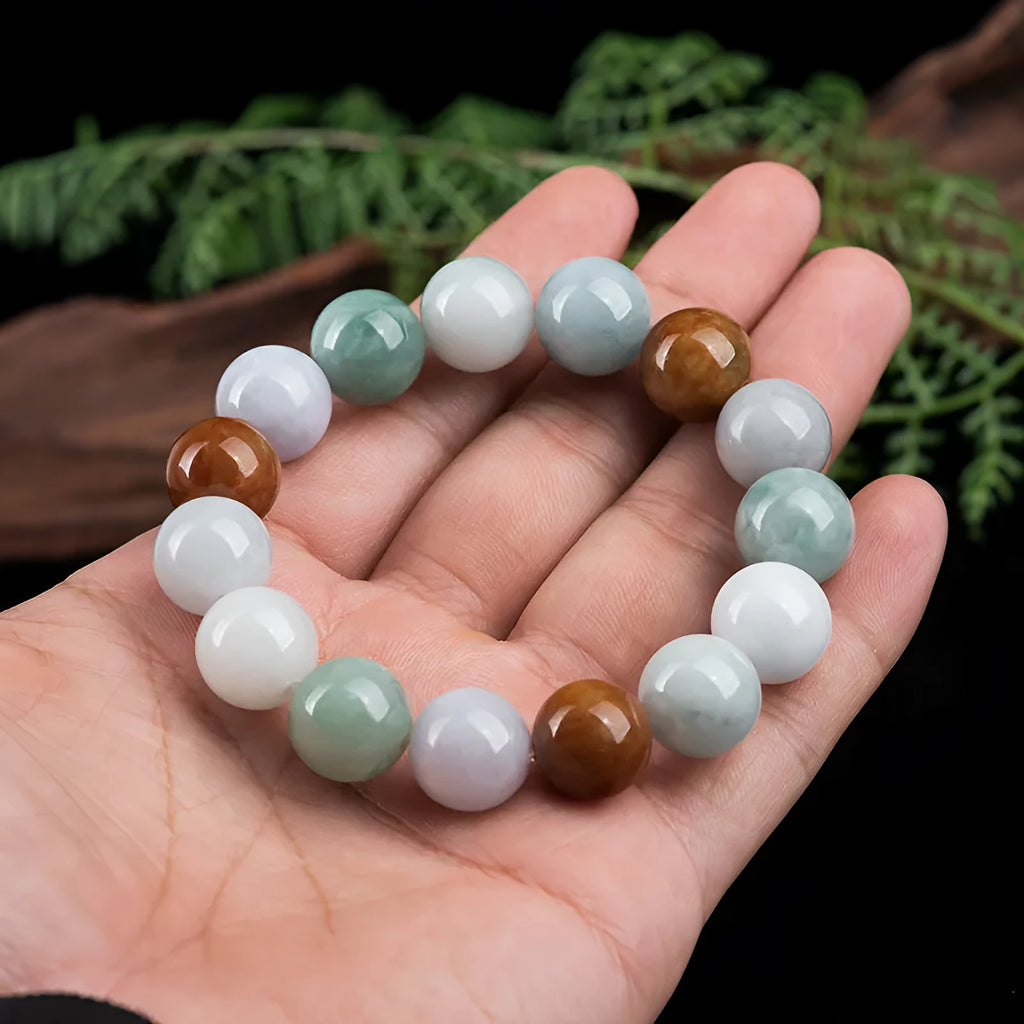 Women's jade bracelet with green, lavender and white beads showing certificate