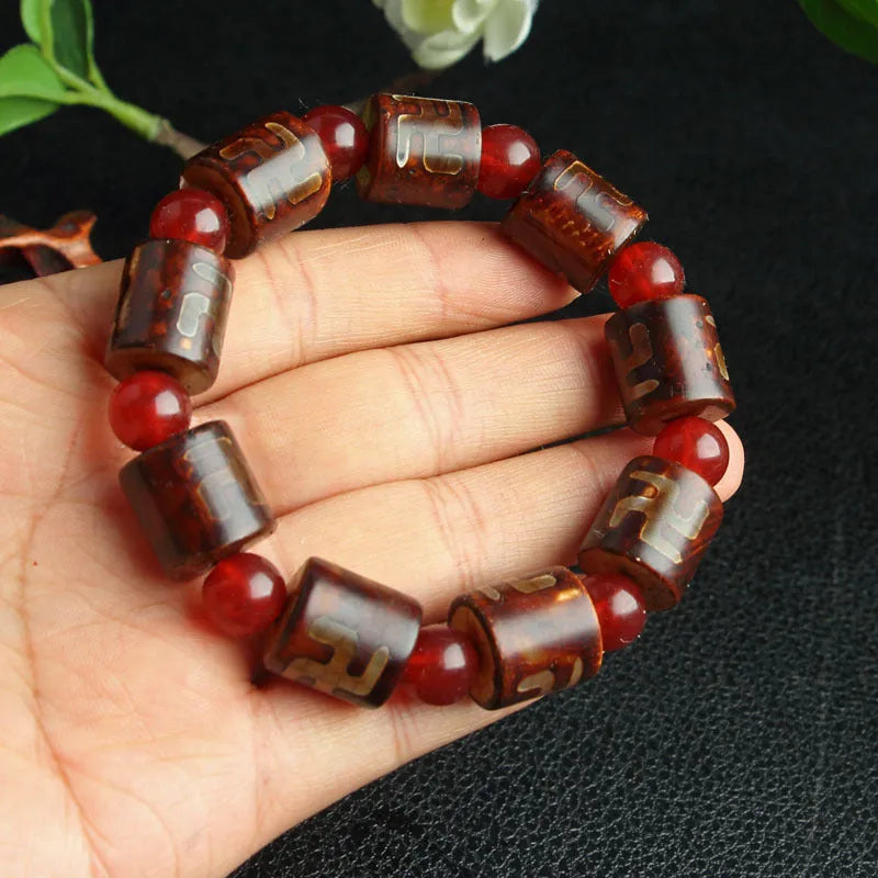 Distressed agate Tibet beads bracelet with three eye dzi design and polished stone beads