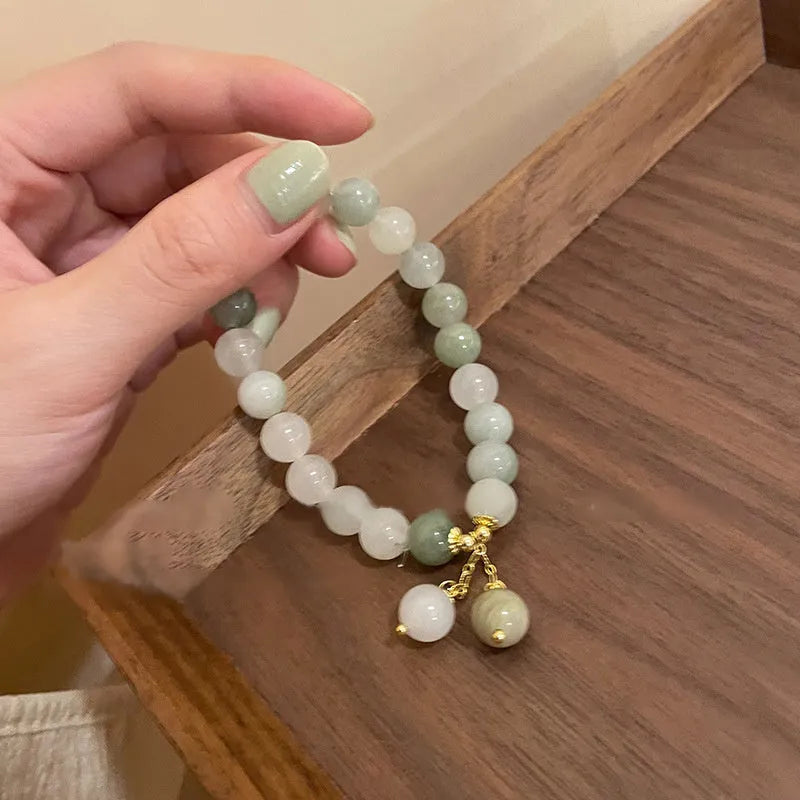 Multi-layer beaded bracelet with small rice-shaped white round beads, handmade ethnic style for women