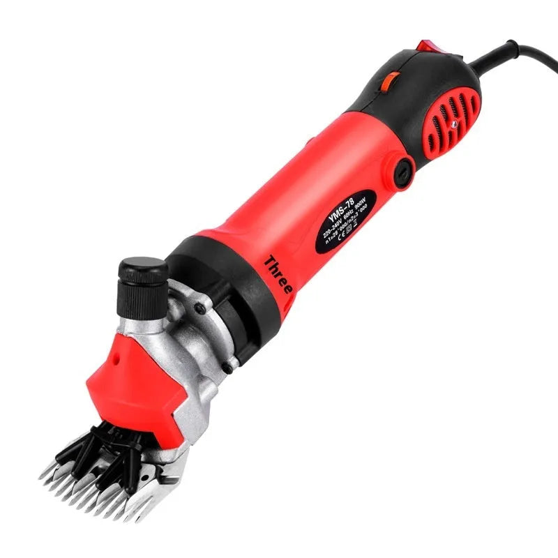 Yellow handled electric wool clipper with blades and maintenance tools in a plastic case