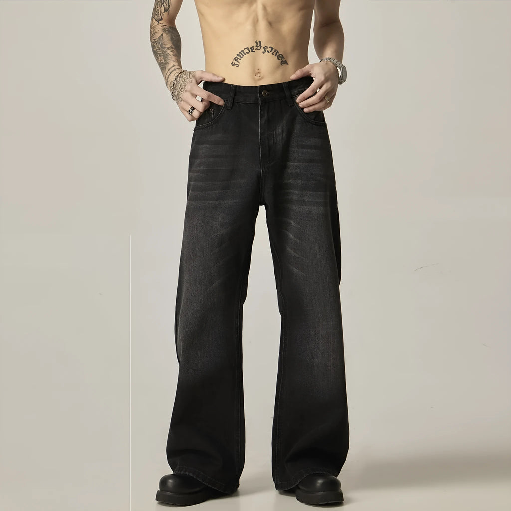 Black loose-fit straight-leg retro jeans with a zipper fly on a mannequin