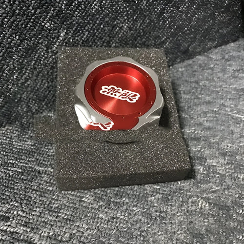 Aluminium alloy oil filter cap for Honda vehicles in multiple colour options.