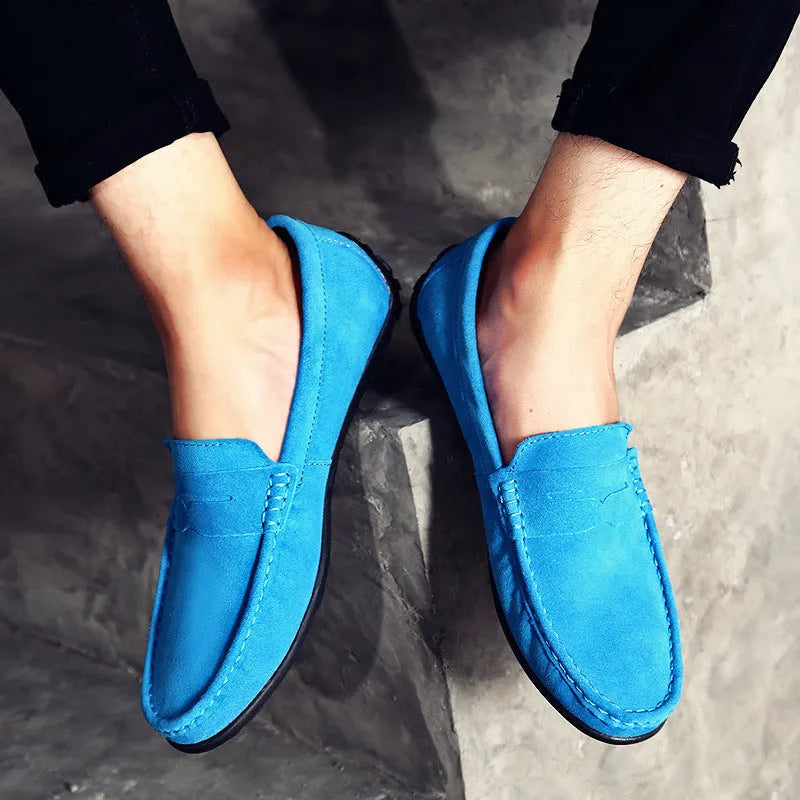 Men's suede leather Gommino loafer in brown, showing round toe and rubber sole.