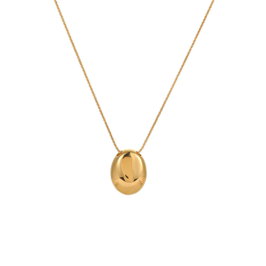 Gold geometric pendant necklace on adjustable stainless steel chain, shown at 41cm length.
