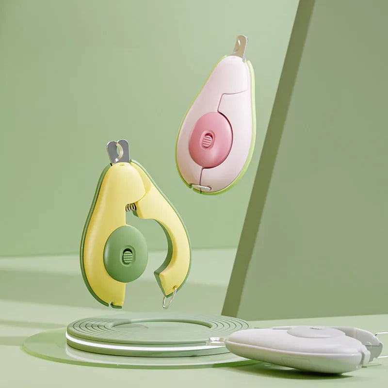 Professional pet nail clipper with LED light on, in green, pink, and white colour options for small dogs and cats.