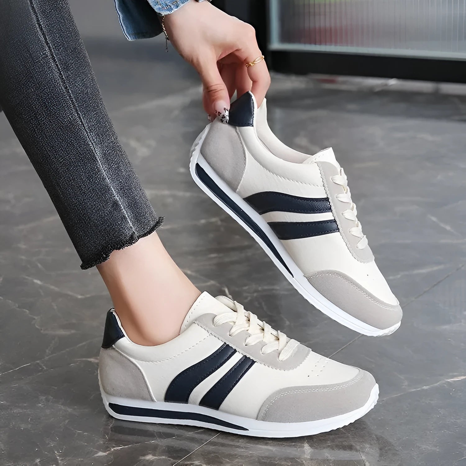 Blue lace-up leisure sneaker with low top design and round toe on rubber sole