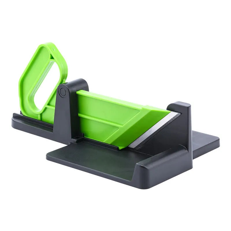 Green and red vegetable cutter with stainless steel blades for cutting carrots and potatoes