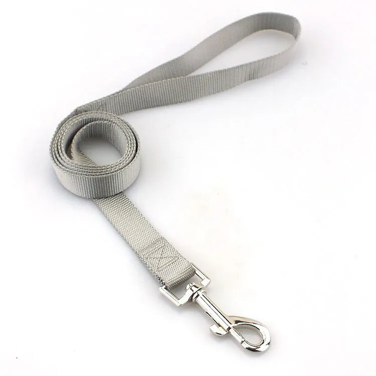 Solid colour polyester dog tug-of-war rope toy shown in blue, with hand loops, for interactive play with pets.