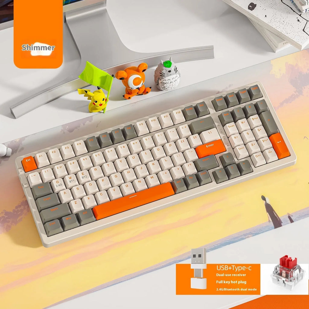Free Wolf K96 Bluetooth and wired dual-mode mechanical keyboard with hot-plug red switches on a desk.