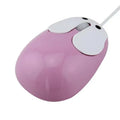 Pink wired rabbit mouse on desktop with USB cable and scroll wheel