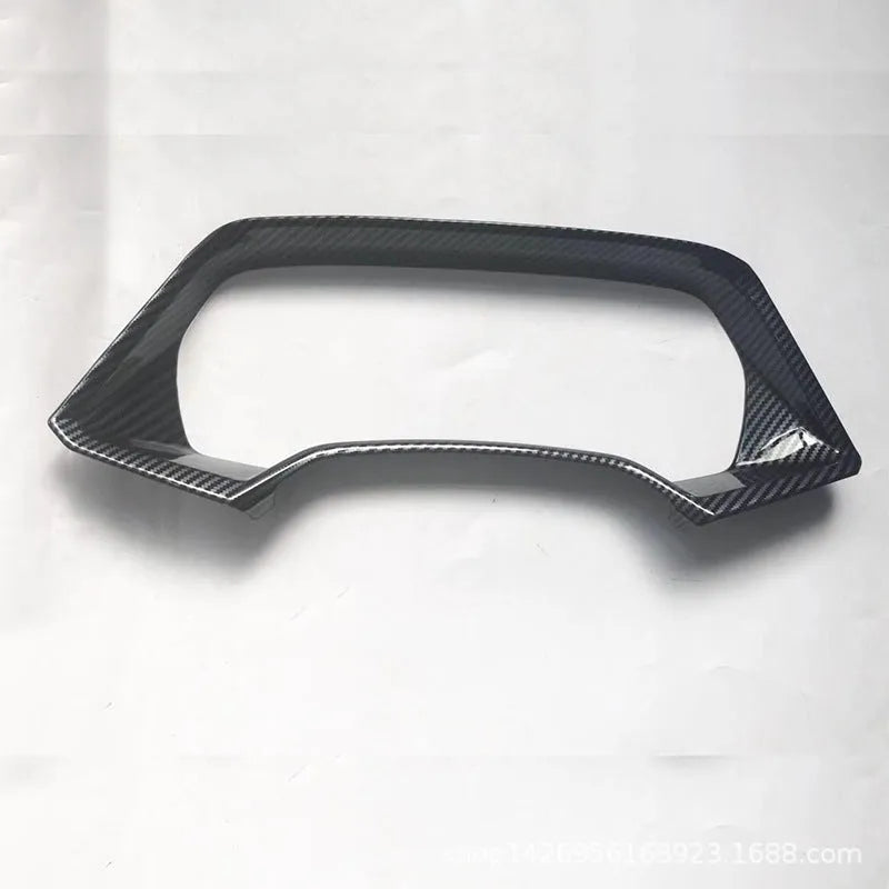 Dashboard decorative frame for BMW X5L in carbon fibre and peach wood finishes