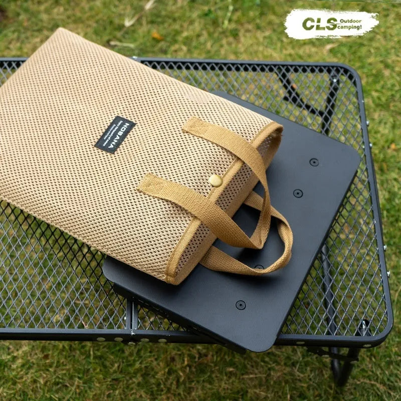 Aluminium dual-use folding camping stool that converts to a small table, shown with tactical storage bag.