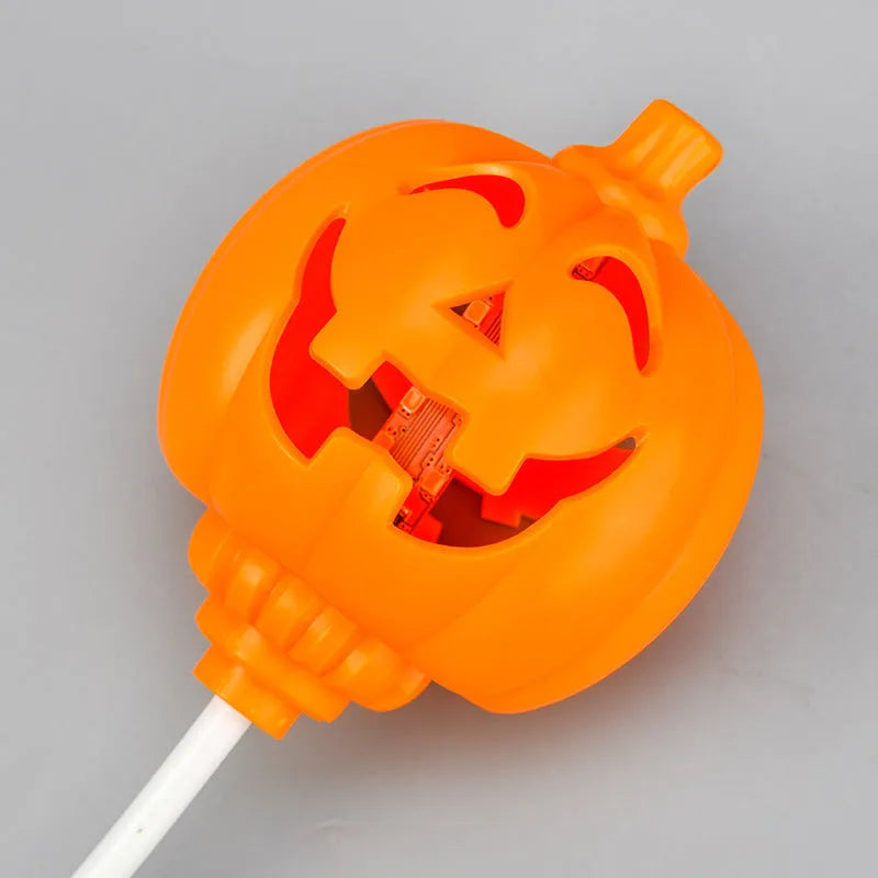 Plastic pumpkin lamp with USB cable, showing yellow and purple light options, scale shown against 8.3x22cm dimensions