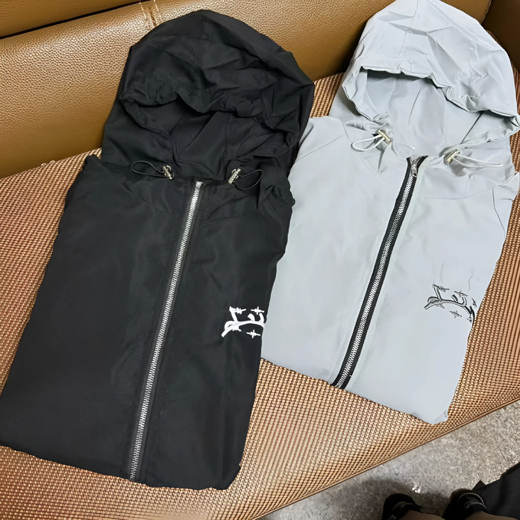 Men's British-style loose fit hooded sunscreen jacket in grey colour showing attached hood and polyester fabric