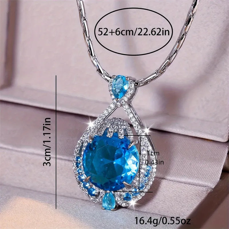 Geometric pendant necklace with blue fireworks cut gemstones on water wave chain