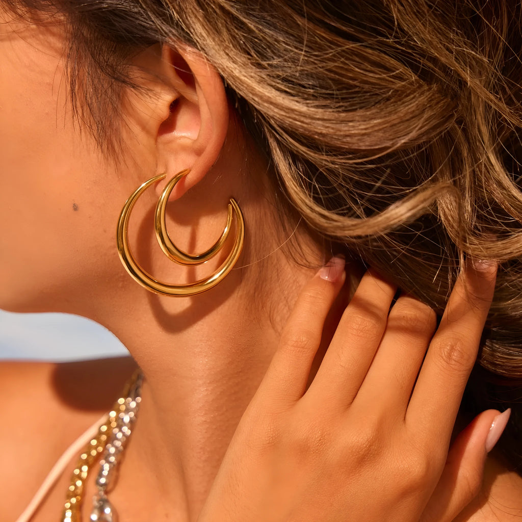 Titanium steel hoop earrings with 18K gold plating in large and small sizes